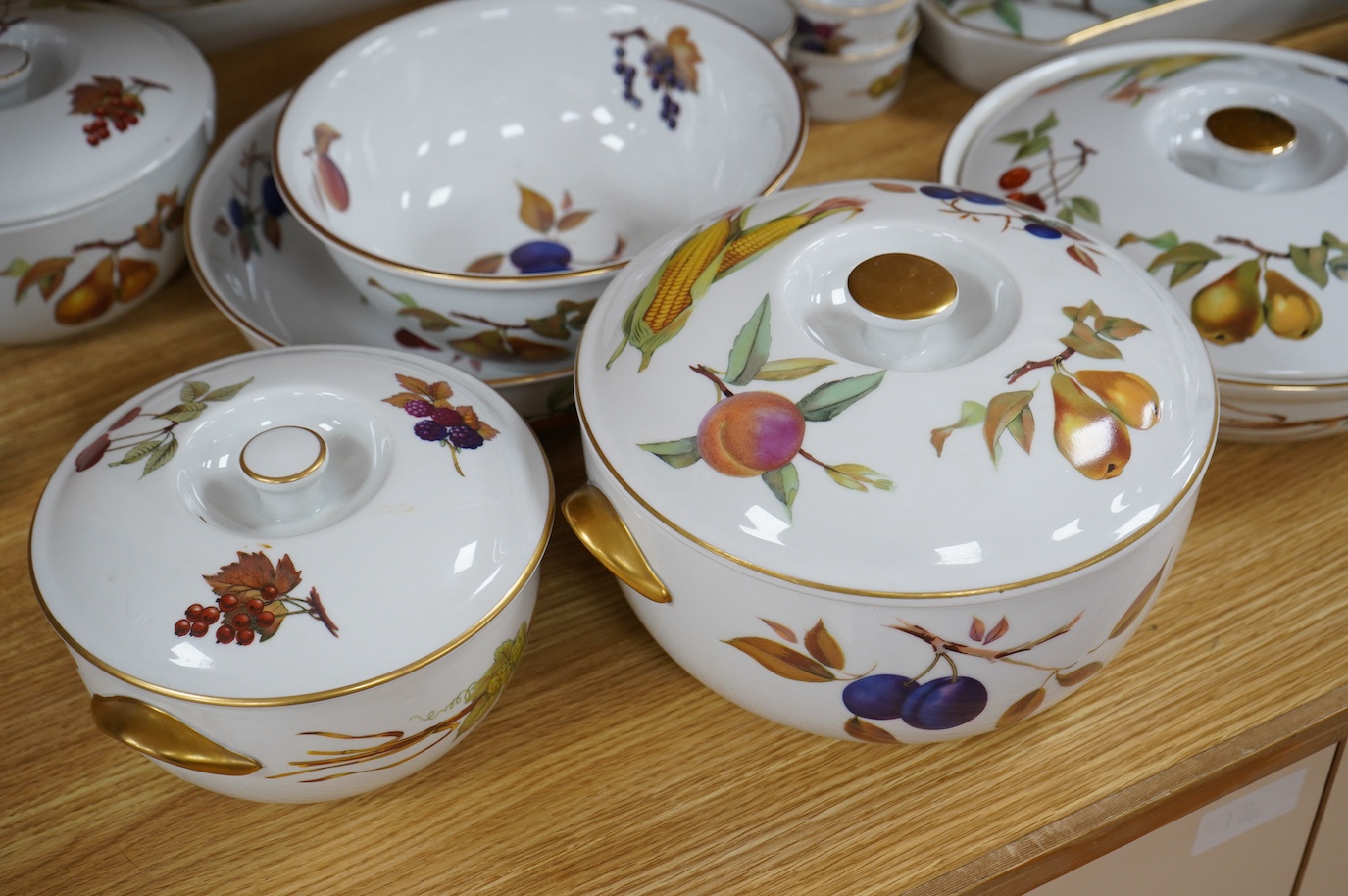 A collection of Royal Worcester Evesham dinnerware to include tureens, dishes and a sauce boat, largest 32cm wide. Condition - fair